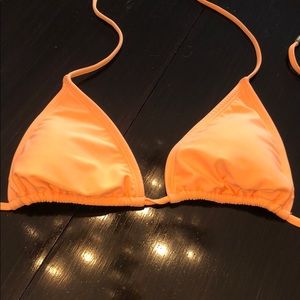 Neon orange bathing suit